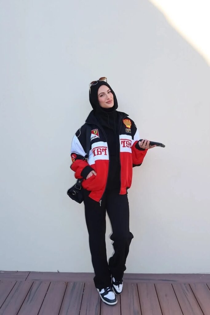 Red, White, and Black Racing Jacket + Black Wide-Leg Trousers + Black and White Sneakers
