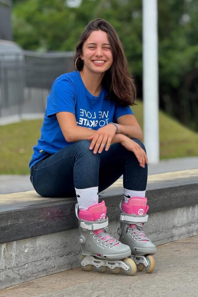 Royal Blue Graphic T-Shirt + Dark Wash Skinny Jeans + Grey & Pink Inline Skates