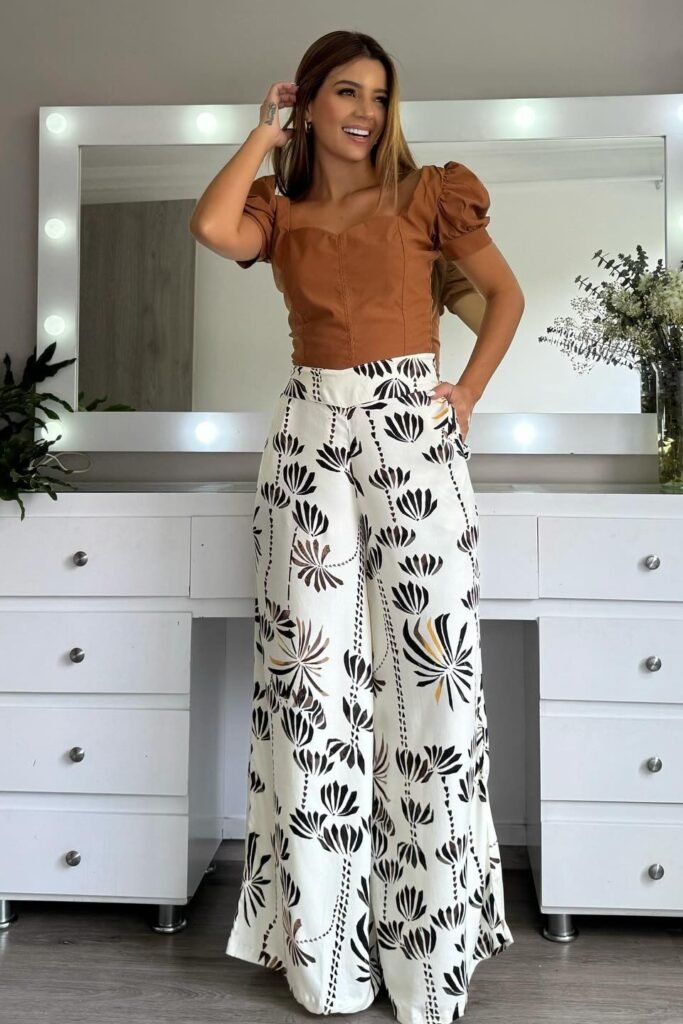 Rust Brown Puff Sleeve Corset Top + White Wide-Leg Trousers with Black Palm Leaf Print