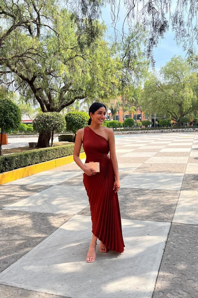 Rust Red One-Shoulder Pleated Maxi Dress + Rectangular Wooden Clutch + Nude Strappy Sandals