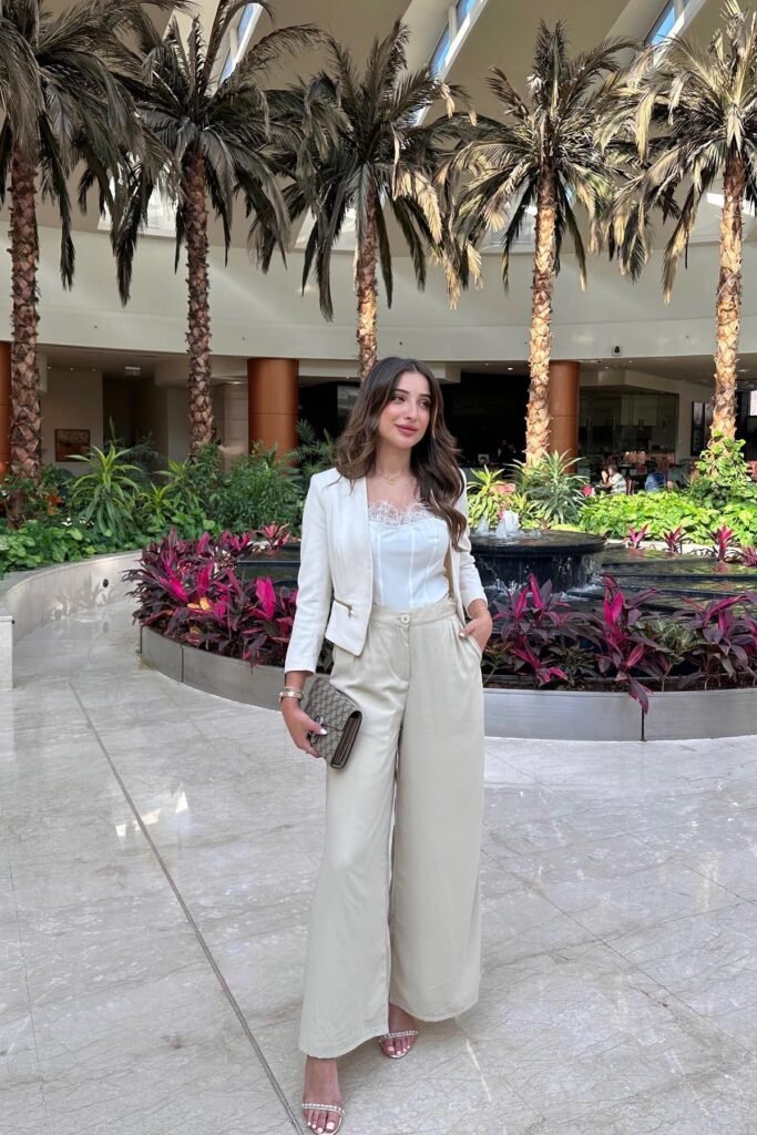 Short Cream Blazer + White Lace-Trim Corset Top + Sage Green Wide-Leg Trousers + Pearl Embellished Heels