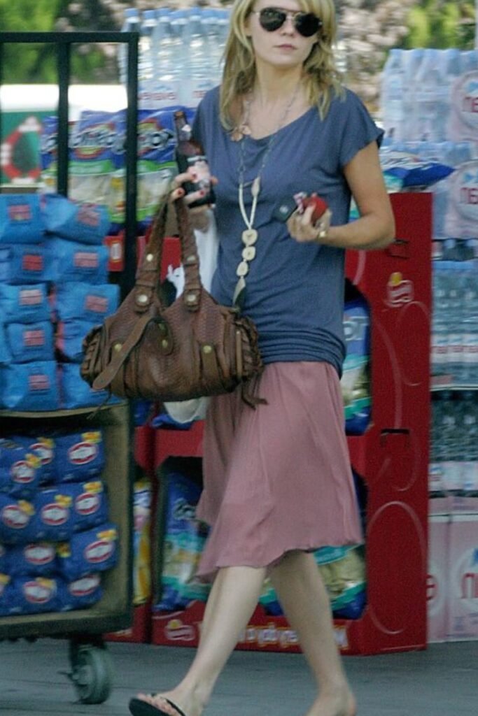 Slouchy Blue T-Shirt + Dusty Rose Midi Skirt + Braided Leather Shoulder Bag