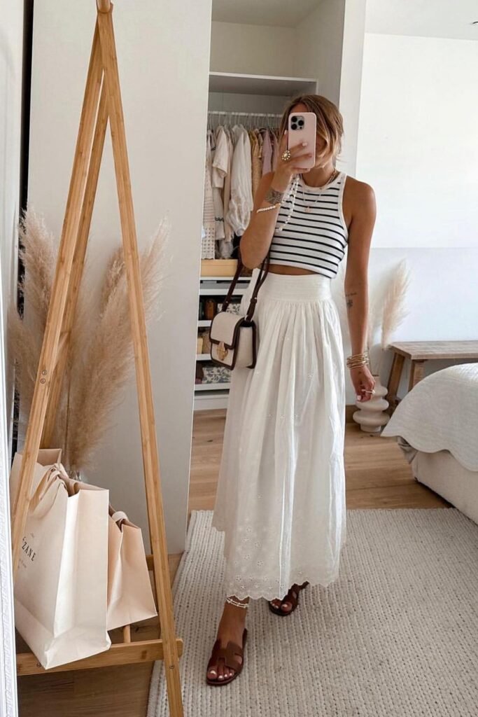 Striped High-Neck Crop Top + White Eyelet Maxi Skirt + Brown Leather Slides
