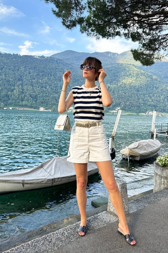 Striped Knit Vest + White High-Waisted Shorts + Black Leather Slides