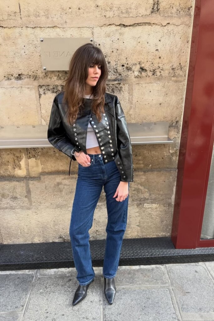 Studded Black Leather Moto Jacket + White Crop Top + Dark Wash Straight Jeans + Black Pointed Boots