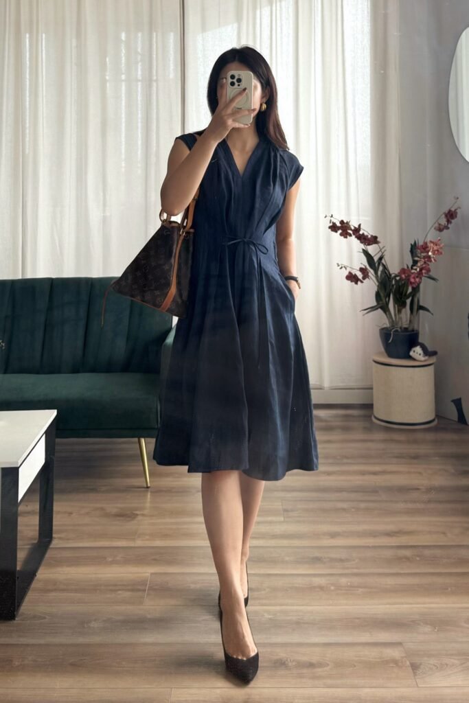 Navy V-Neck Pleated Dress + Brown Monogram Bucket Bag + Black Pointed Pumps