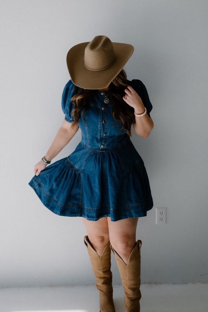 Tan Cowboy Hat + Puff-Sleeve Denim Mini Dress + Tall Suede Camel Boots