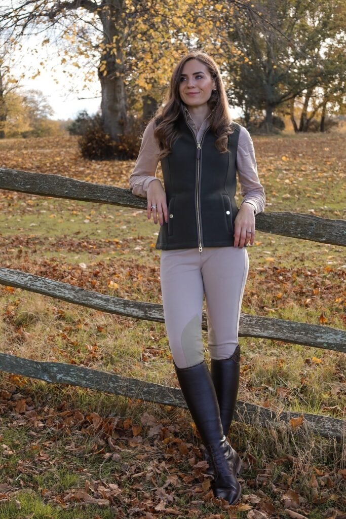 Tan Long Sleeve Shirt + Olive Green Puffer Vest + Beige Equestrian Trousers + Dark Brown Riding Boots