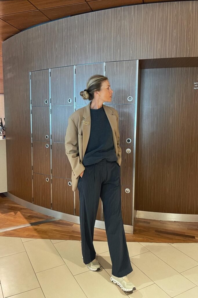 Tan Oversized Blazer + Charcoal Grey Crew-Neck Top + Dark Grey Pinstripe Wide-Leg Trousers + Pale Green Athletic Sneakers