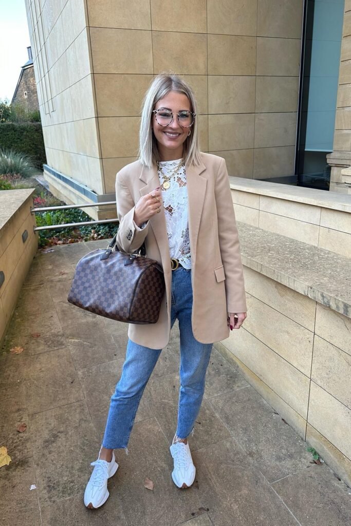 Tan Oversized Blazer + White Lace Top + Blue Cropped Jeans + White Athletic Sneakers