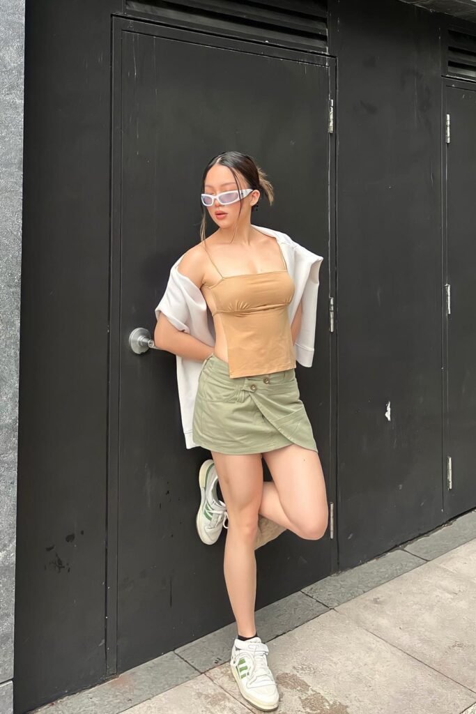 Tan Spaghetti Strap Crop Top + Olive Green Wrap Mini Skirt + White and Green Sneakers
