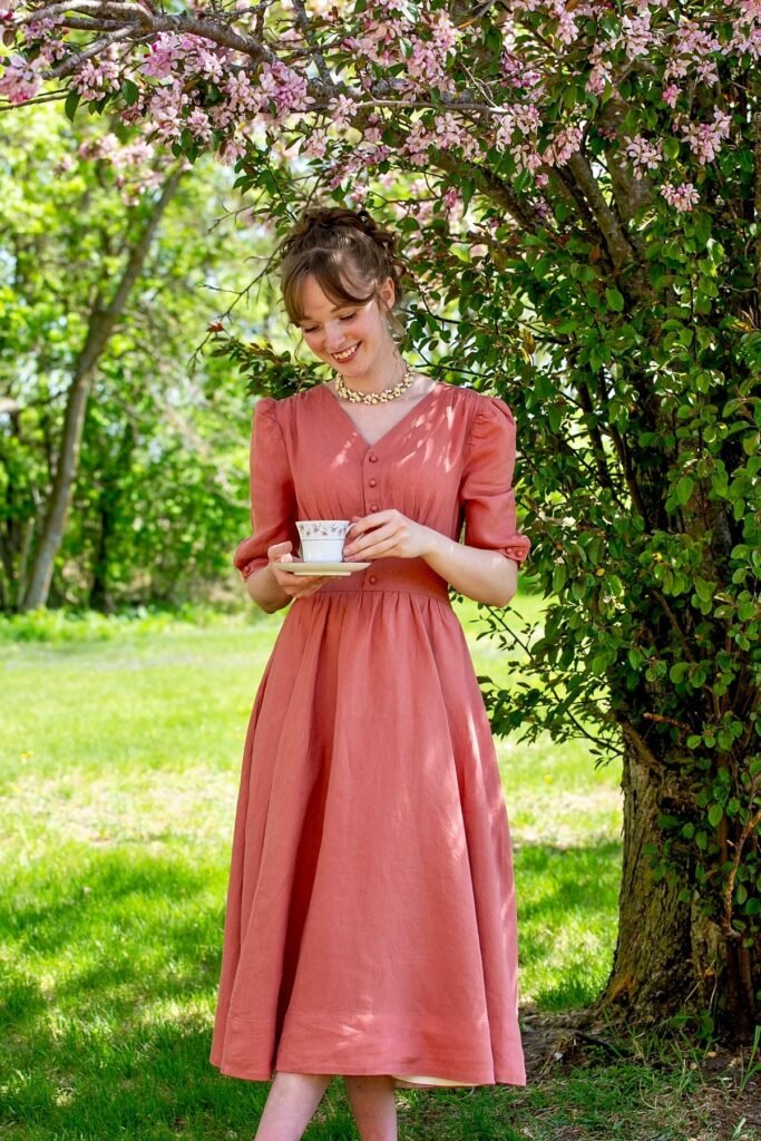 Terracotta V-Neck Button-Down Dress + Floral Necklace + White Tea Cup