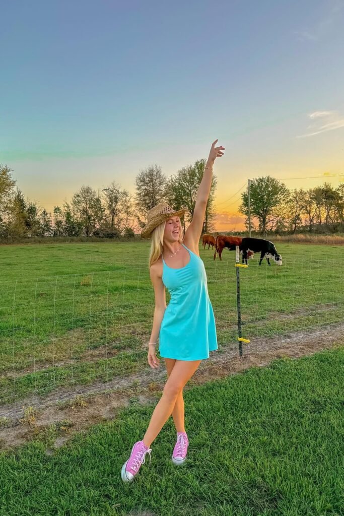 Turquoise Athletic Dress + Pink High-Top Sneakers + Straw Cowboy Hat