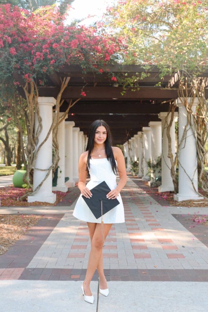 White A-Line Mini Dress + White Pointed-Toe Heels + Graduation Cap