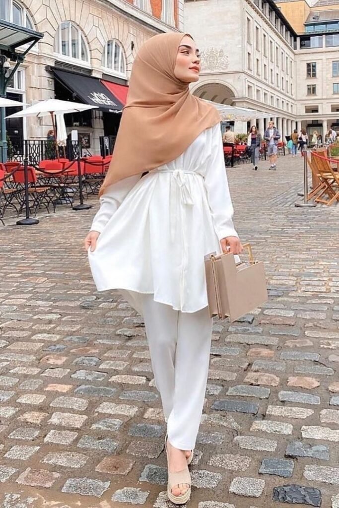 White Belted Tunic + White Trousers + Tan Hijab + Beige Wedge Sandals
