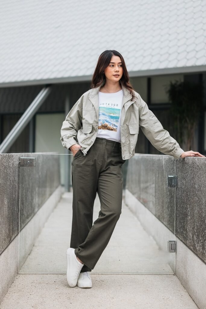 White "Breathe" Graphic Tee + Sage Green Bomber Jacket + Olive Cargo Pants + White Sneakers