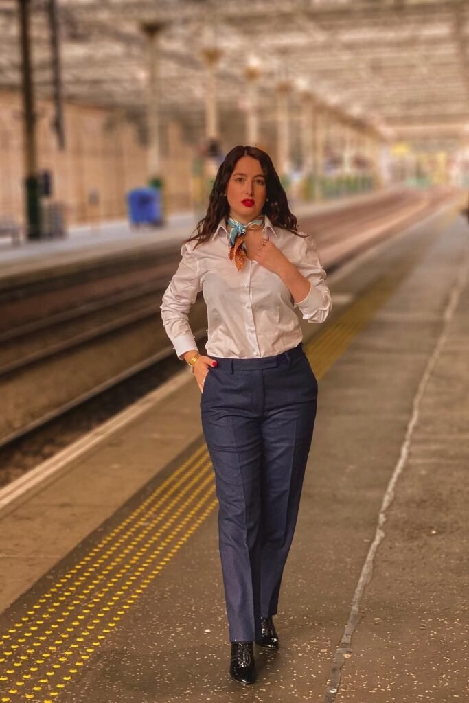 White Button-Down Shirt + Small Patterned Silk Necktie + Navy Tailored Trousers + Black Lace-Up Oxford Shoes