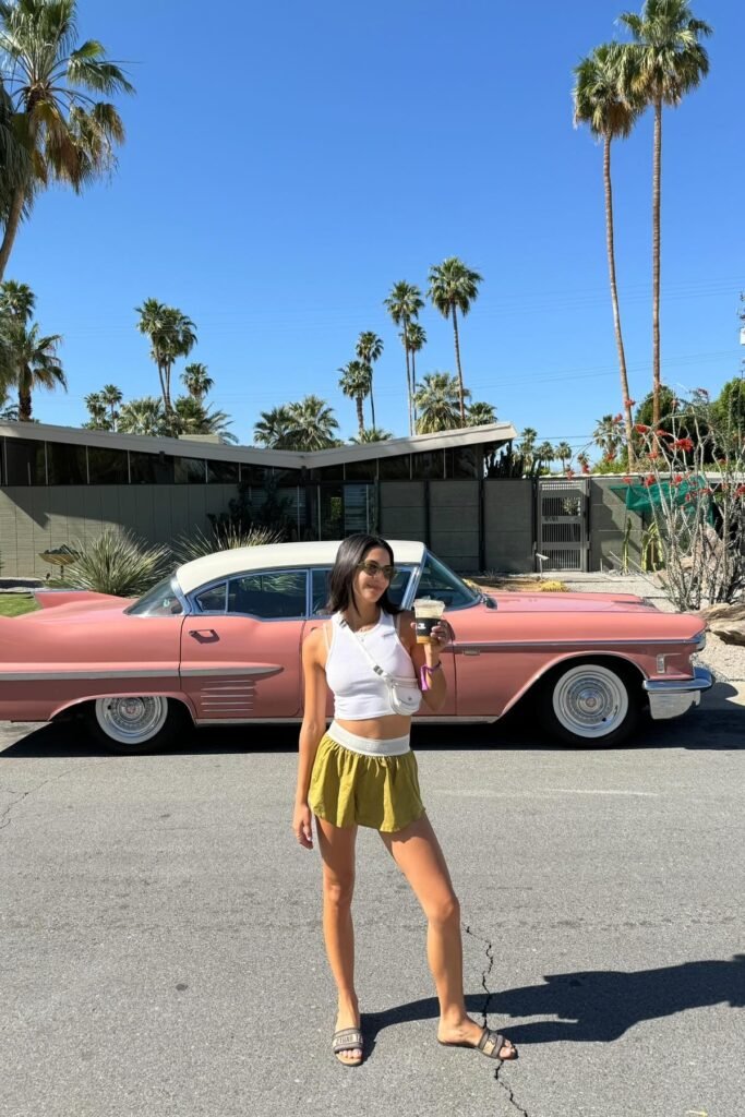 White Cropped Tank Top + Olive Green Athletic Shorts + Black Slide Sandals