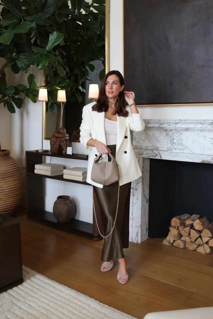 White Double-Breasted Blazer + Olive Green Satin Midi Skirt + Grey Suede Mules