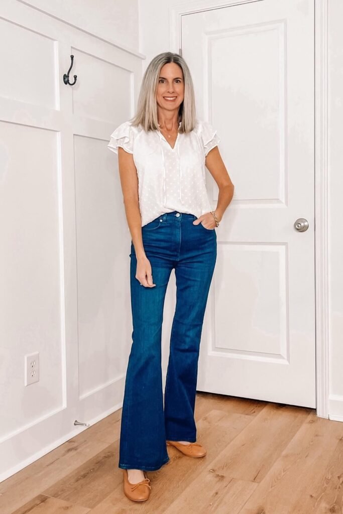 White Eyelet Flutter-Sleeve Top + Dark Wash Flare Jeans + Tan Ballet Flats