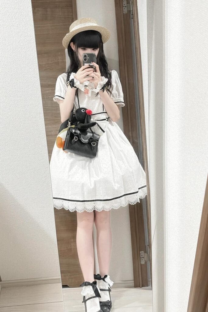 White Eyelet Lace Mini Dress + Straw Boater Hat + Black Satchel Bag + Black Bow Flats