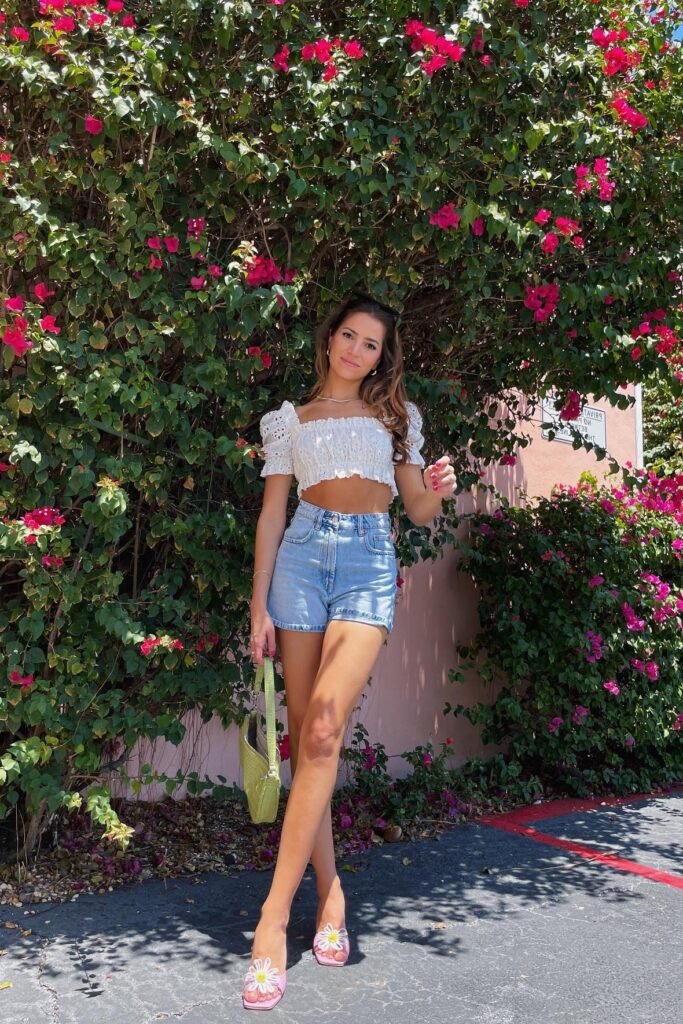 White Eyelet Puff Sleeve Crop Top + High-Waisted Denim Shorts + Pink Floral Slides
