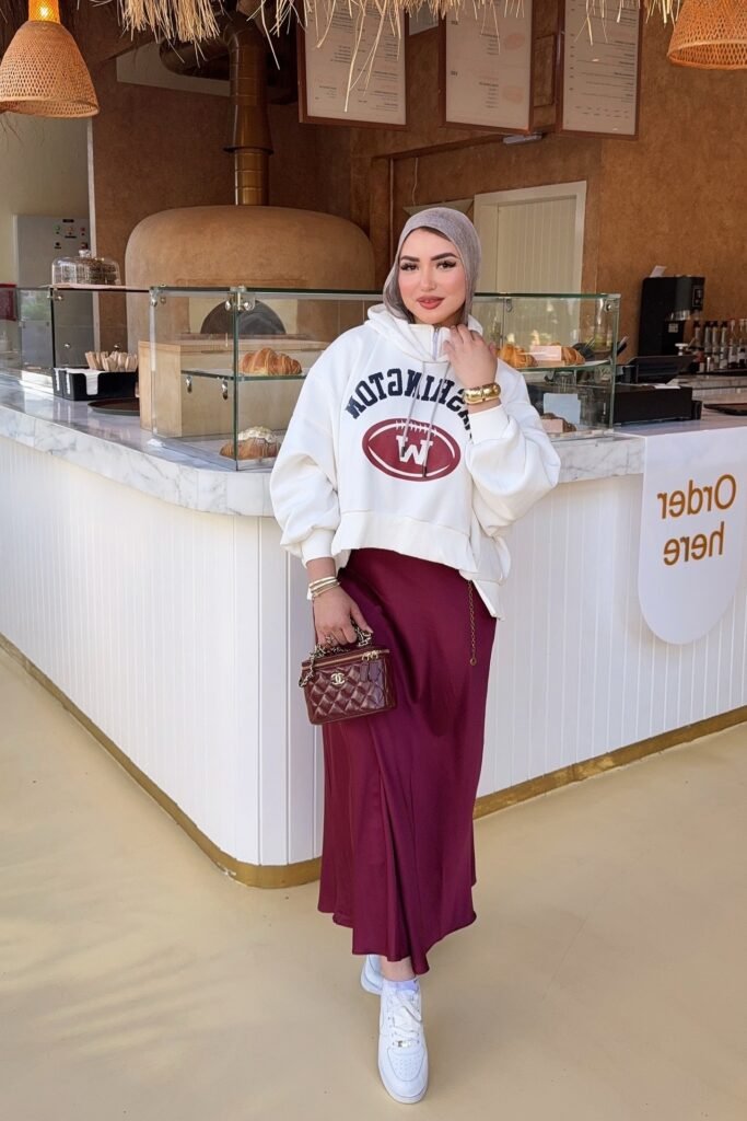 White Graphic Oversized Hoodie + Burgundy Satin Maxi Skirt + White Sneakers