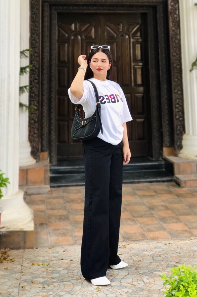 White Graphic T-shirt + Black Wide-Leg Jeans + White Pointed Heels