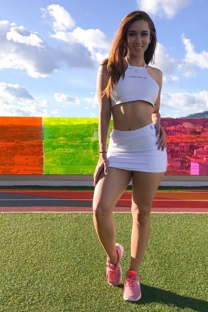 White Halter Crop Top + White Athletic Mini Skirt + Pink Sneakers