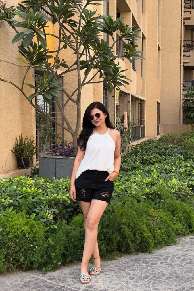 White Halter Neck Top + Distressed Black Denim Shorts + Embroidered Multi-Color Slides