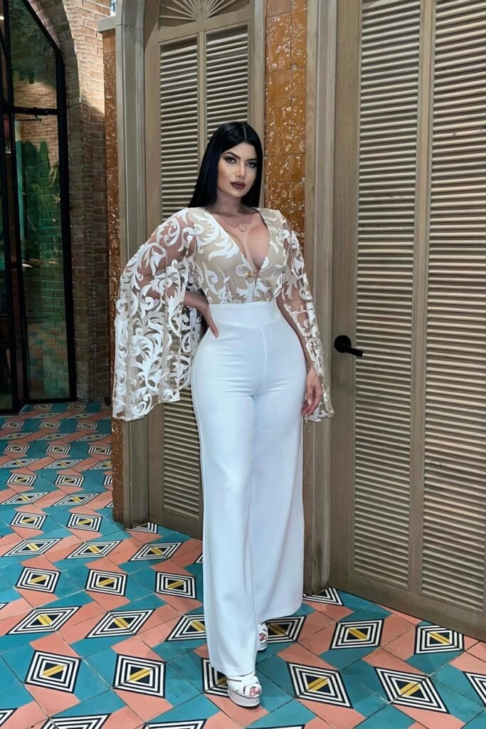 White High-Waisted Wide-Leg Trousers + Beige V-Neck Bodysuit with Embroidered Cape Sleeves + White Platform Sandals