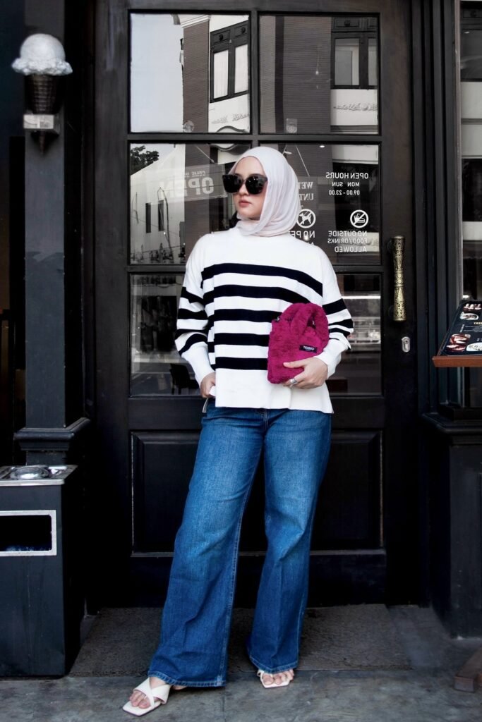  White Hijab + Black and White Striped Sweater + Dark Wash Wide-Leg Jeans + White Strappy Sandals