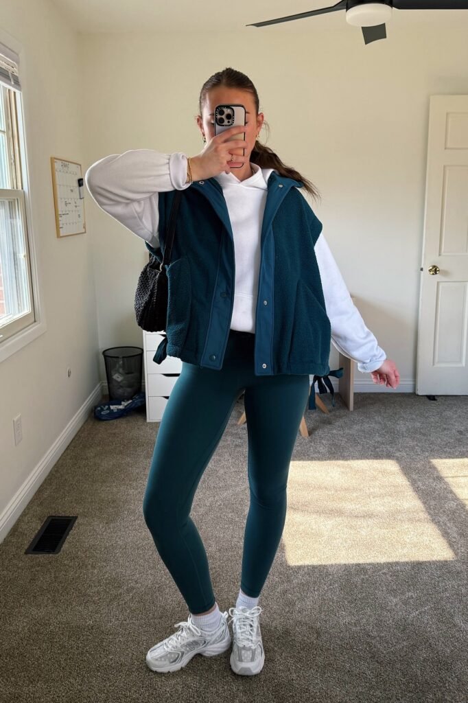 White Hoodie + Teal Fleece Vest + Teal Leggings + White Sneakers