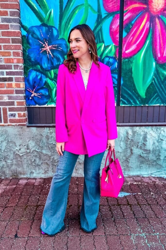 White Lace Camisole + Bright Fuchsia Oversized Blazer + Medium Wash Flare Jeans + Fuchsia Pointed-Toe Heels
