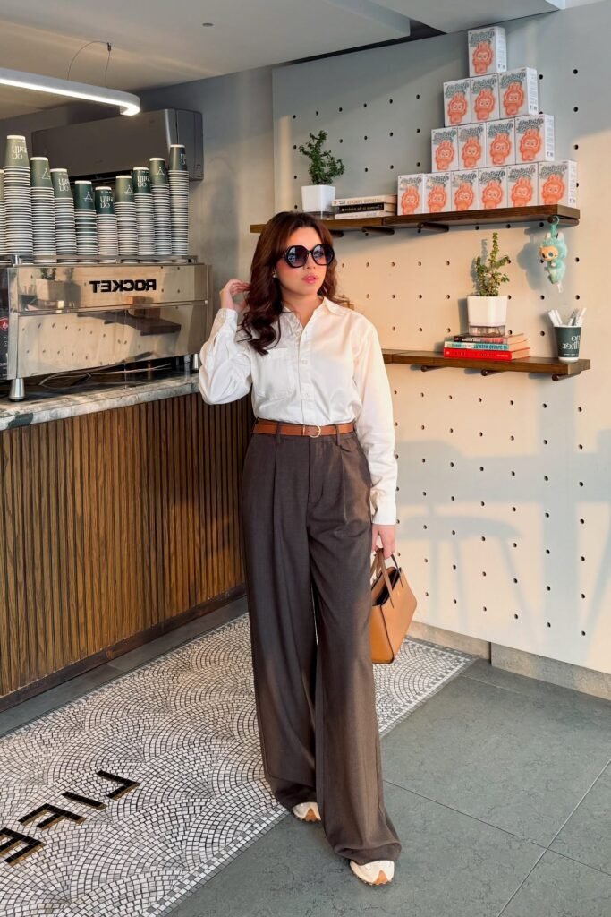 White Long-Sleeve Button-Up Shirt + Dark Grey Pleated Trousers + Tan Sneakers