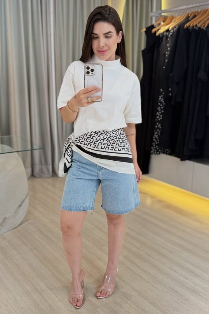 White Mock-Neck T-shirt + Patterned Waist Scarf + Light Wash Denim Shorts + Clear Heeled Sandals