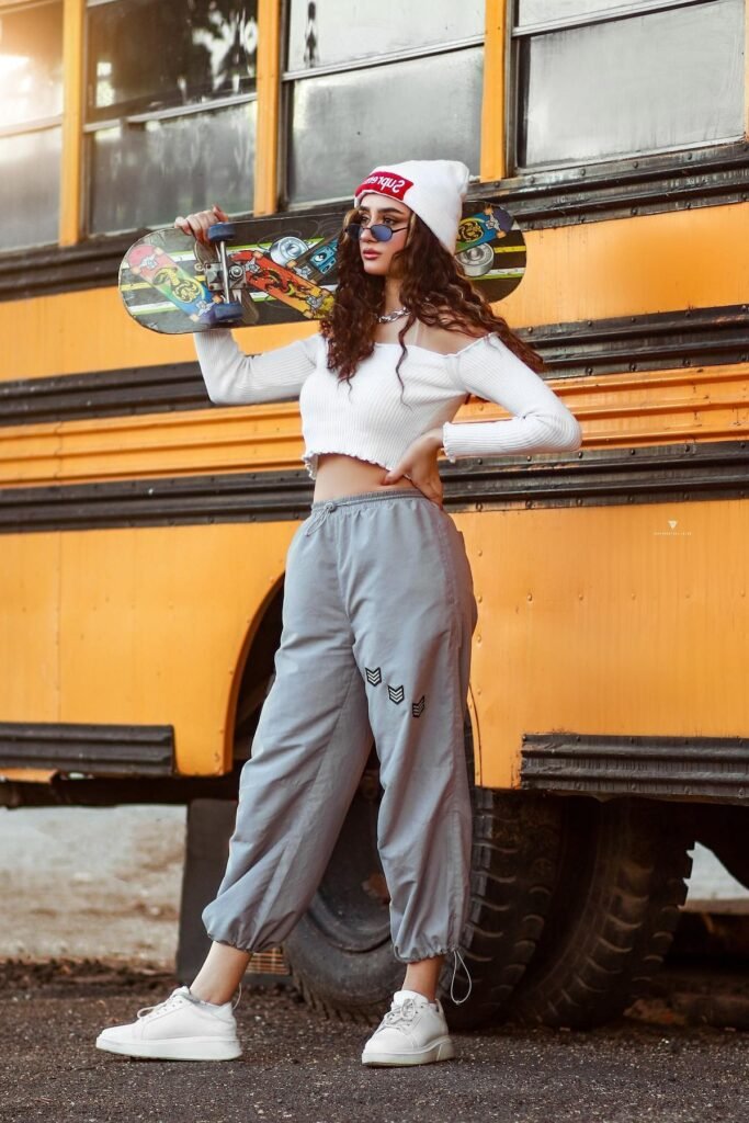 White Off-the-Shoulder Crop Top + Grey Joggers + Chunky White Sneakers