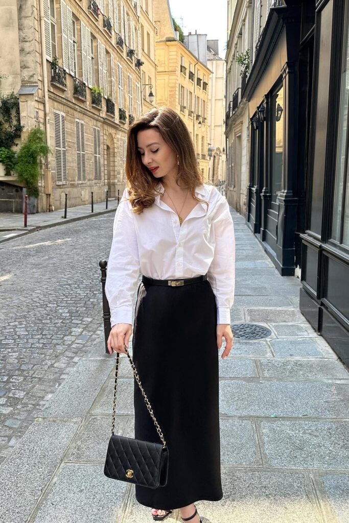 White Oversized Button-Down Shirt + Black Satin Maxi Skirt + Black Strappy Sandals