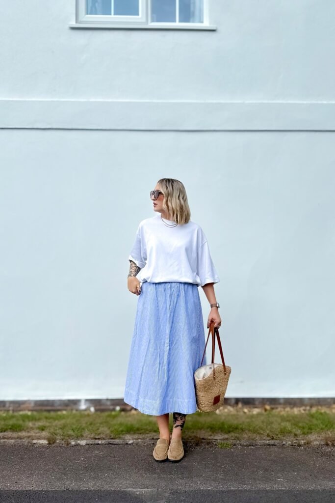 White Oversized T-shirt + Blue Striped Midi Skirt + Tan Suede Loafers