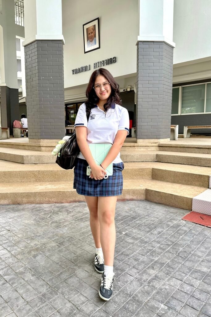 White Polo Shirt + Blue Plaid Mini Skirt + Black and White Sneakers with White Socks