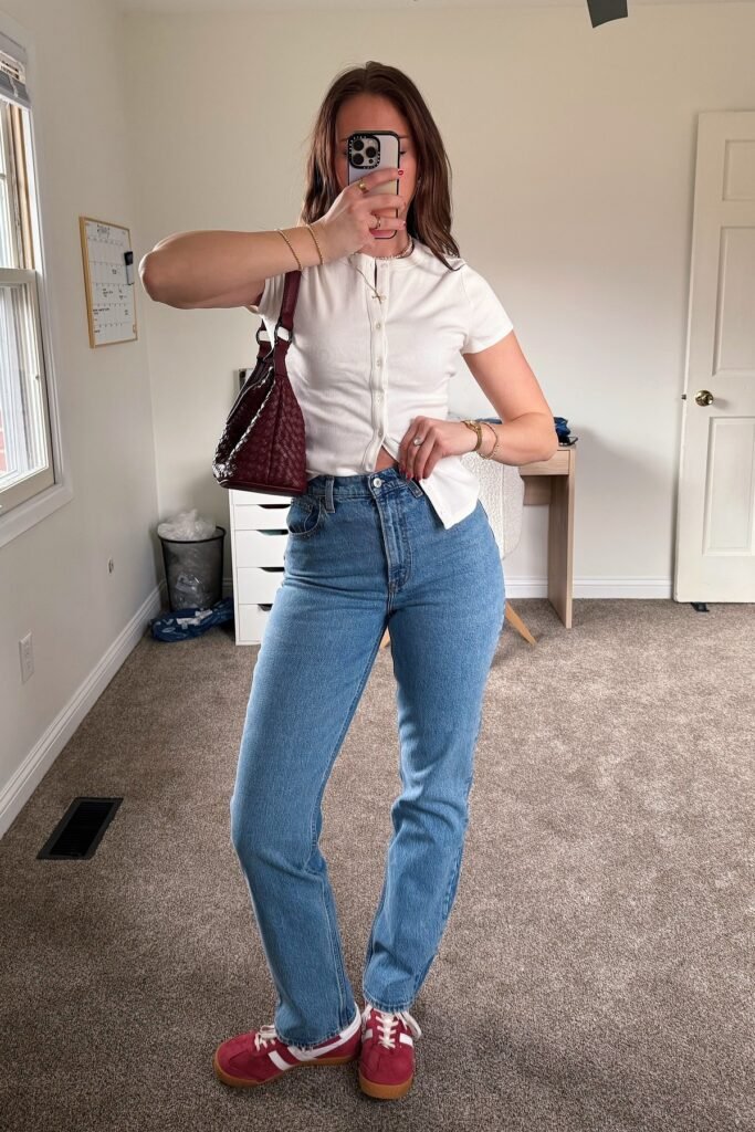 White Ribbed Cardigan + High-Waisted Blue Jeans + Red Sneakers