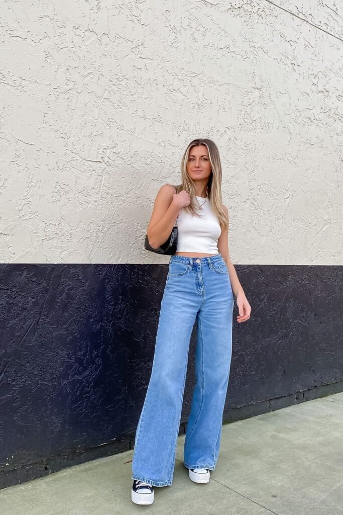 White Ribbed Tank Top + Light Wash Wide-Leg Jeans + Black & White Platform Sneakers