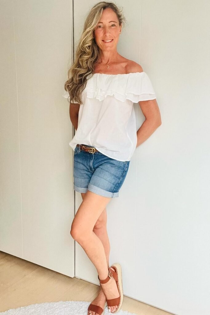 White Ruffle Off-The-Shoulder Top + Cuffed Denim Shorts + Brown Strappy Sandals