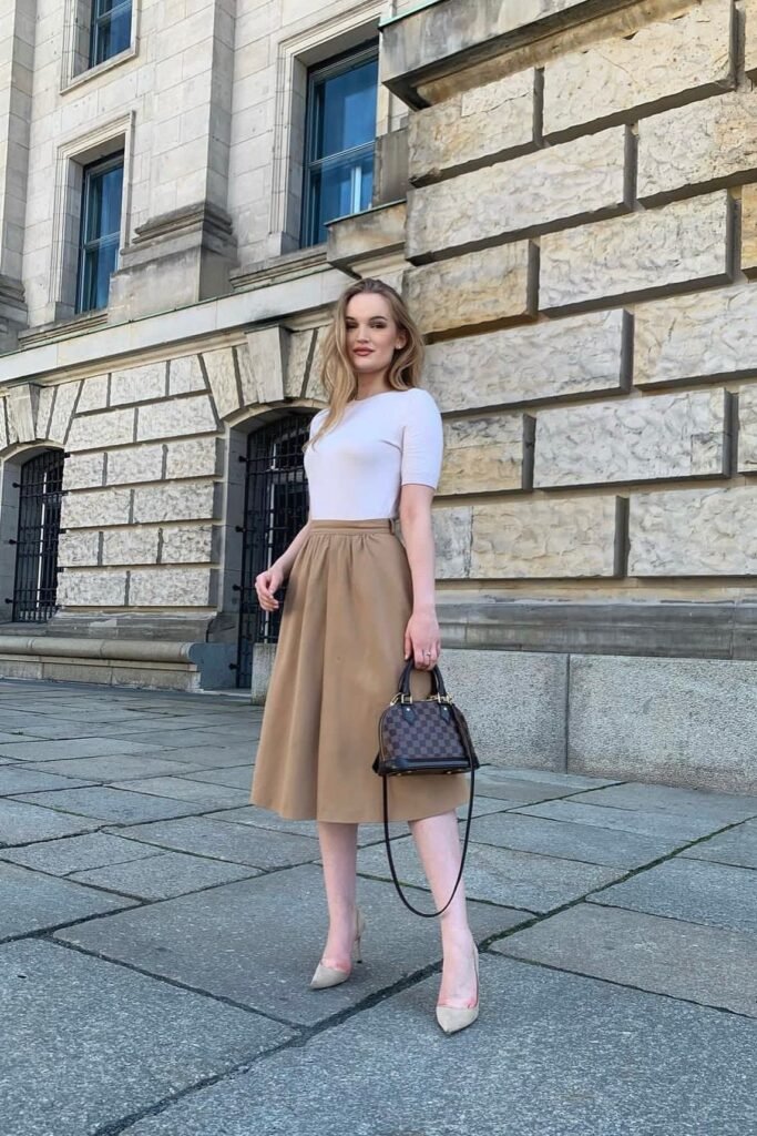 White Short-Sleeve Knit Top + Camel A-Line Midi Skirt + Beige Suede Pumps