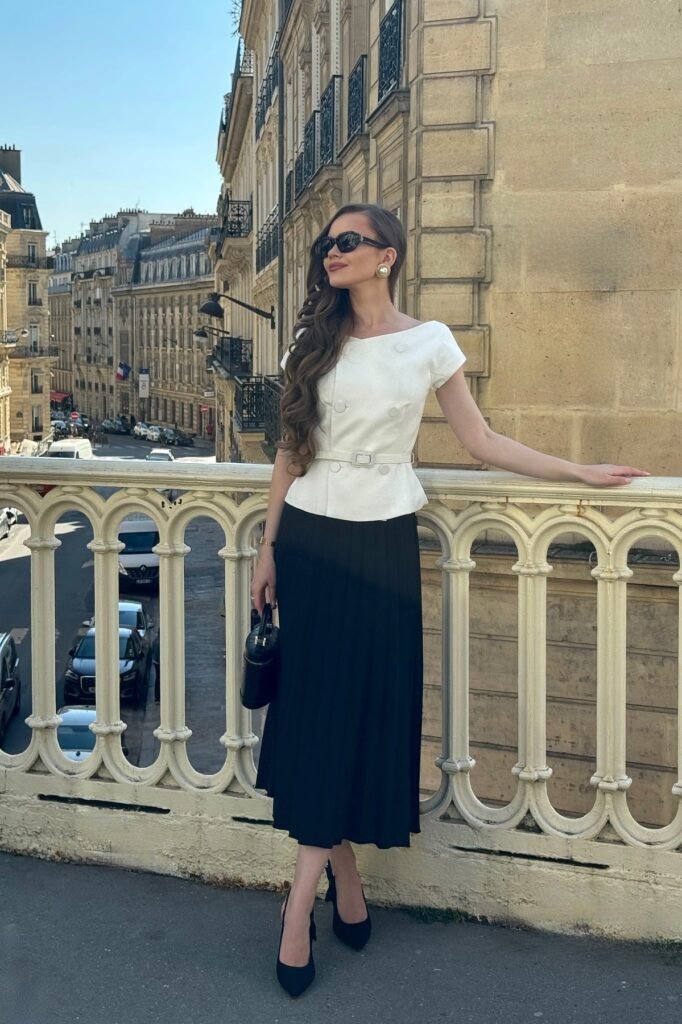 White Short-Sleeved Peplum Top + Black Pleated Midi Skirt + Black Pointed Pumps