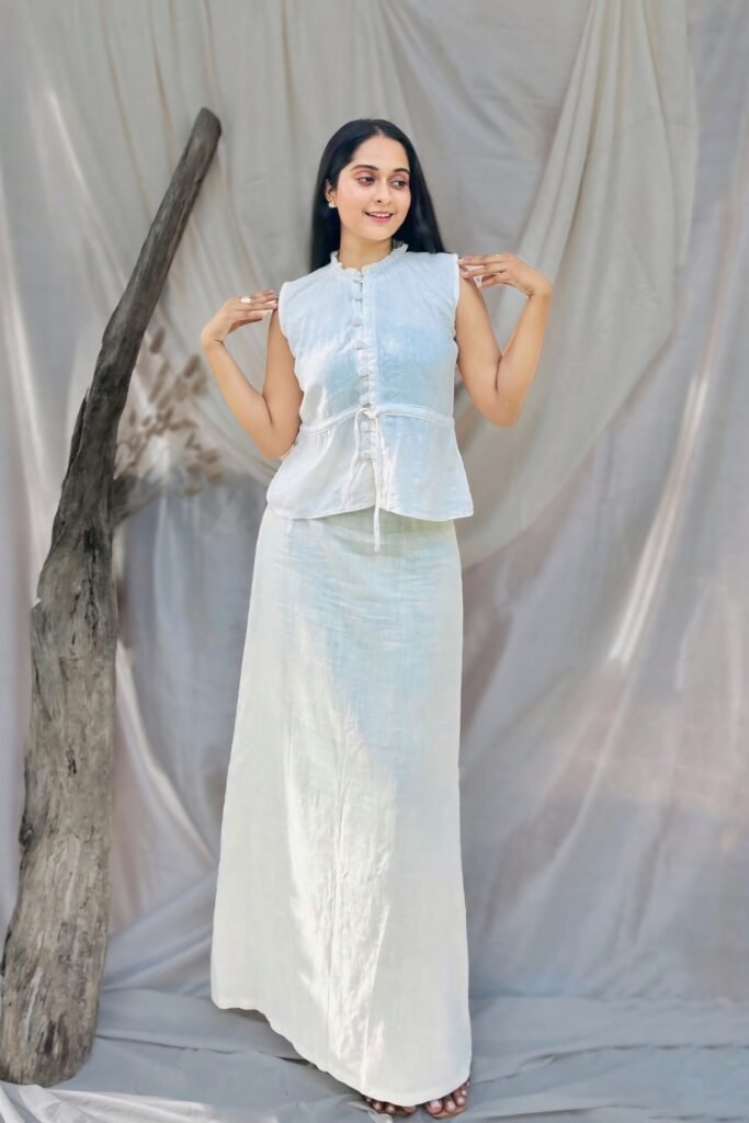 White Sleeveless Peplum Blouse + White Straight Linen Maxi Skirt + Brown Flat Sandals