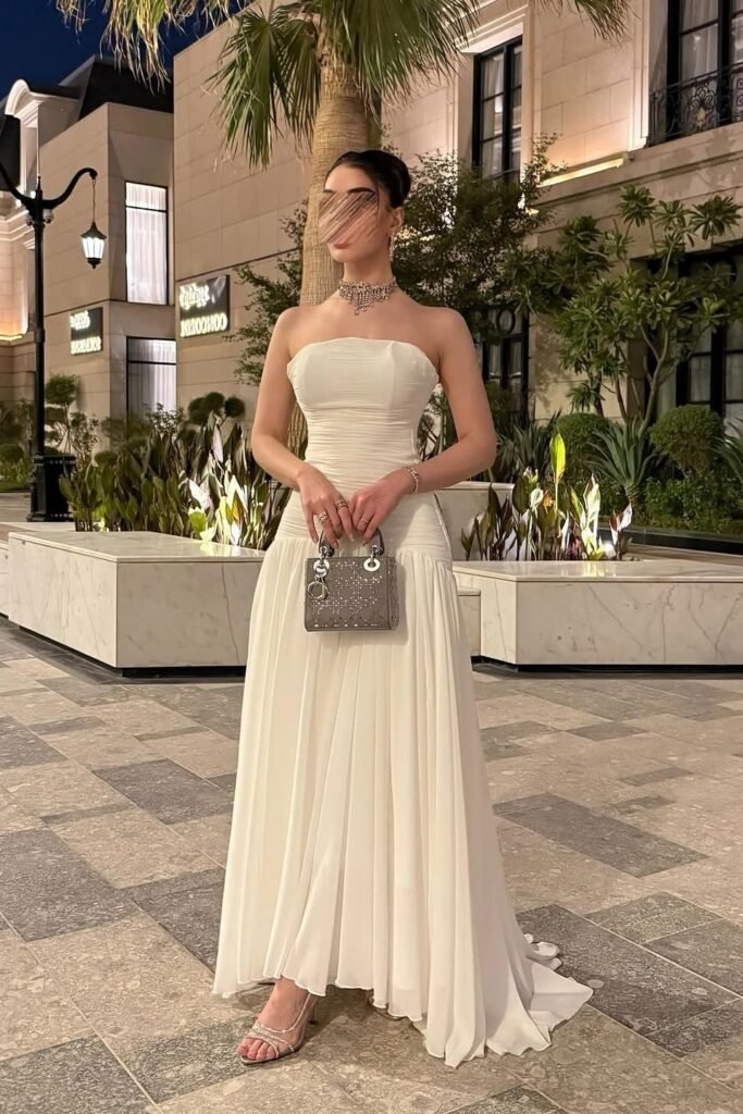 White Strapless Ruched Maxi Dress + Silver Statement Necklace + Grey Quilted Handbag