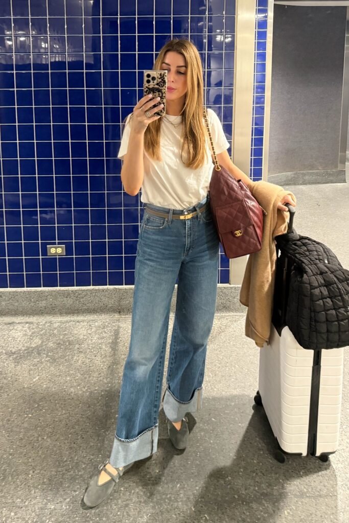 White T-Shirt + Medium Wash Cuffed Wide-Leg Jeans + Grey Mary Jane Flats