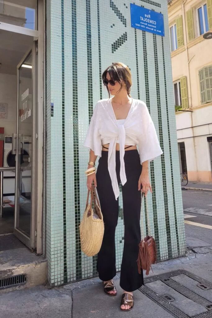 White Tie-Front Bell-Sleeve Blouse + Black High-Waisted Flared Trousers + Shiny Bronze Slides