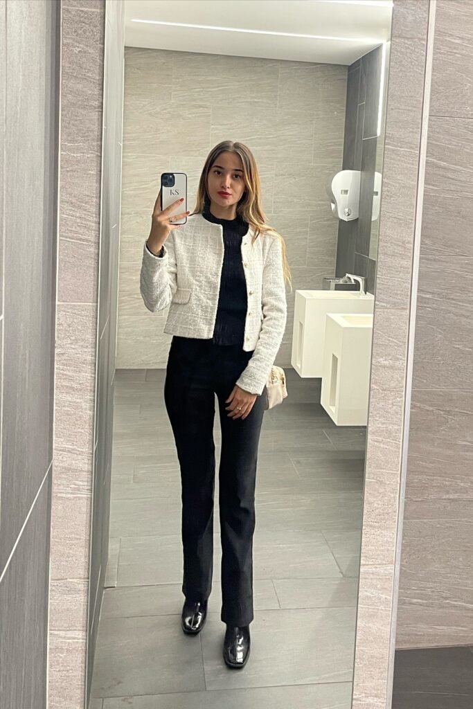 White Tweed Cropped Jacket + Black Mock-Neck Top + Black Slim Trousers + Black Patent Leather Boots